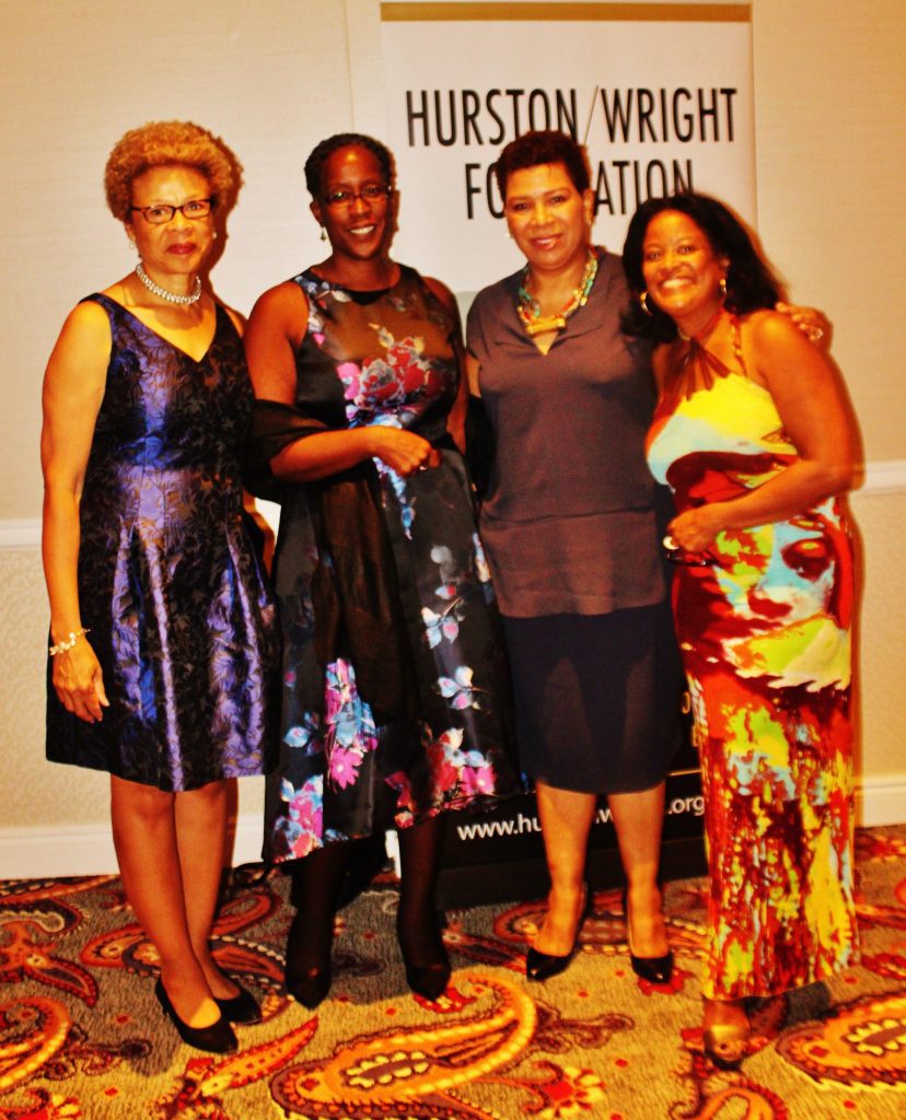 Executive Director Deborah Heard, Treasurer Audrey Hipkins, and H/W Chair Darlene Taylor welcome Mistress of Ceremonies Michel Martin.
