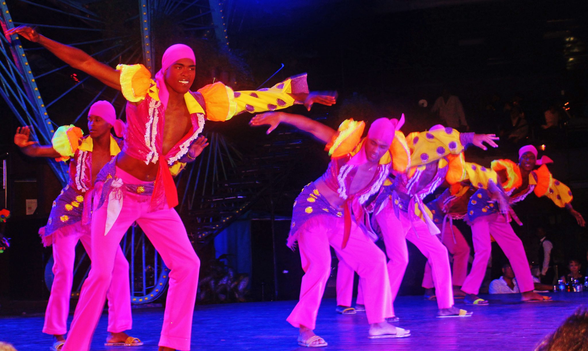 How these dancers never missed a beat while tapping out a hard rhythmic cadence in their wooden slippers is beyond this reviewer’s comprehension!