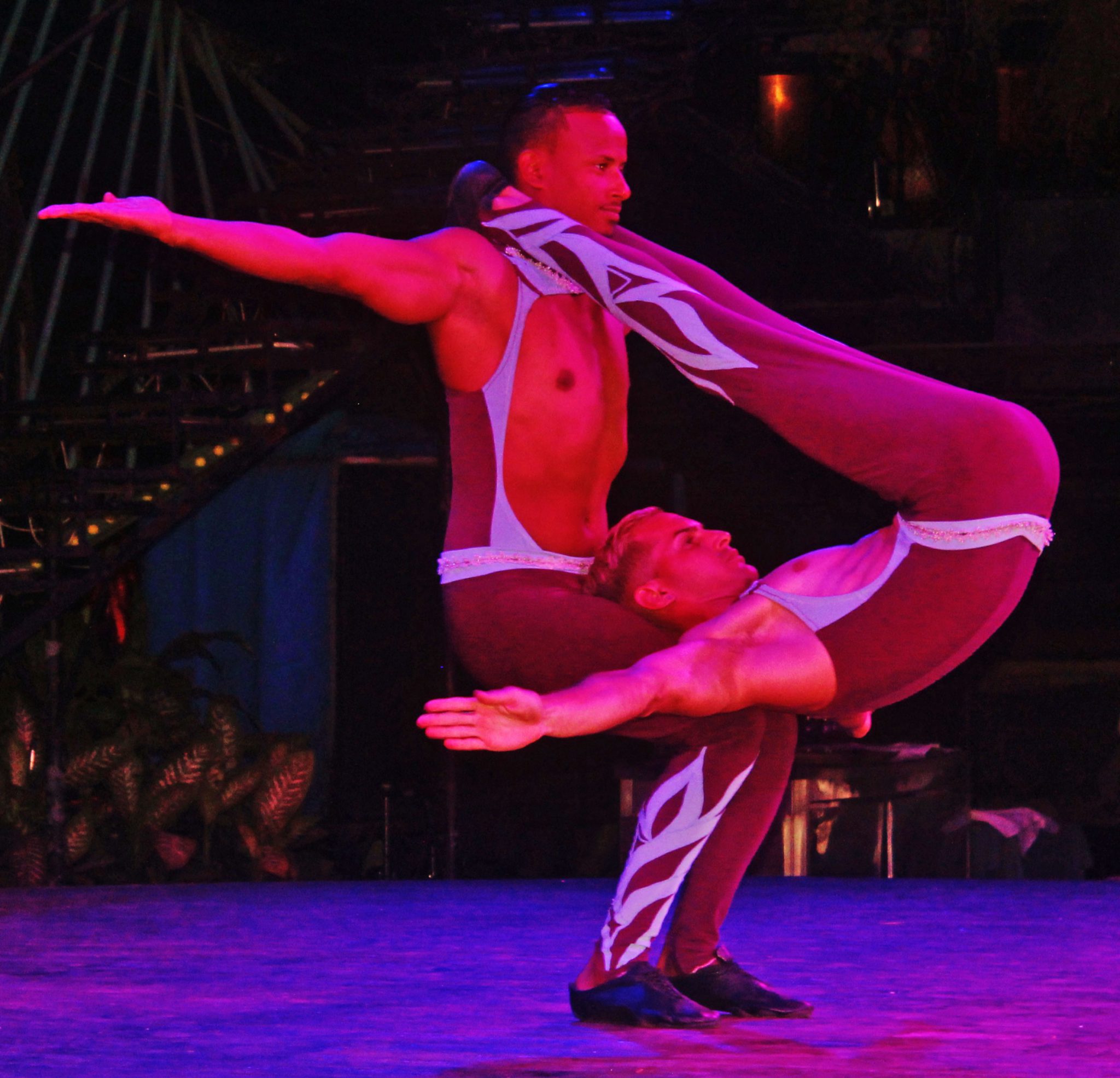 The power and grace of these two acrobats sent a hush over the Tropicana in an unexpected display of near Olympic quality strength and endurance.